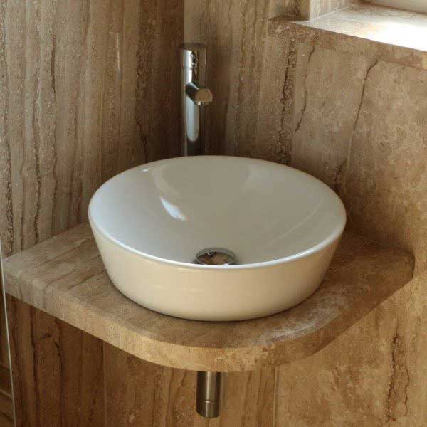 Ensuite-Bathroom-sink-with-wood-effect-tiles-600x600
