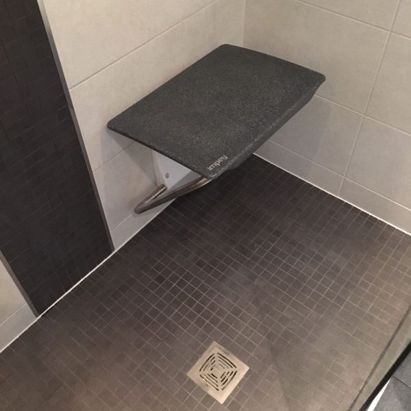 Seat-in-shower-for-easy-access-bathroom-600x600